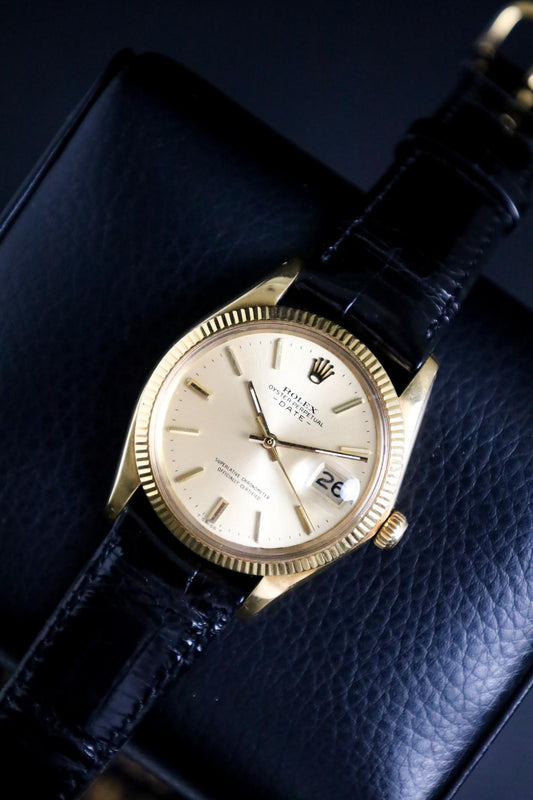 Rolex Oyster Perpetual Date 18K Yellow Gold Champagne Dial